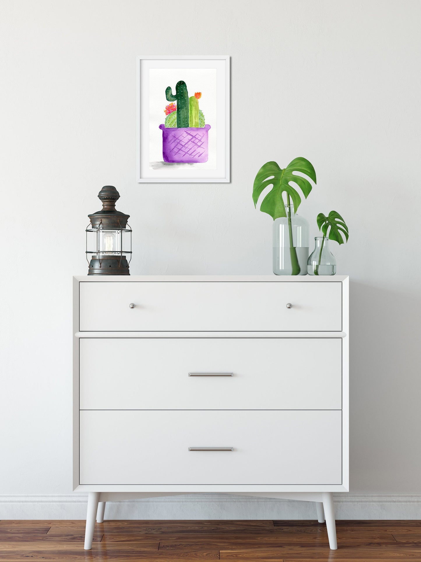 Flowering cactus in a purple planter