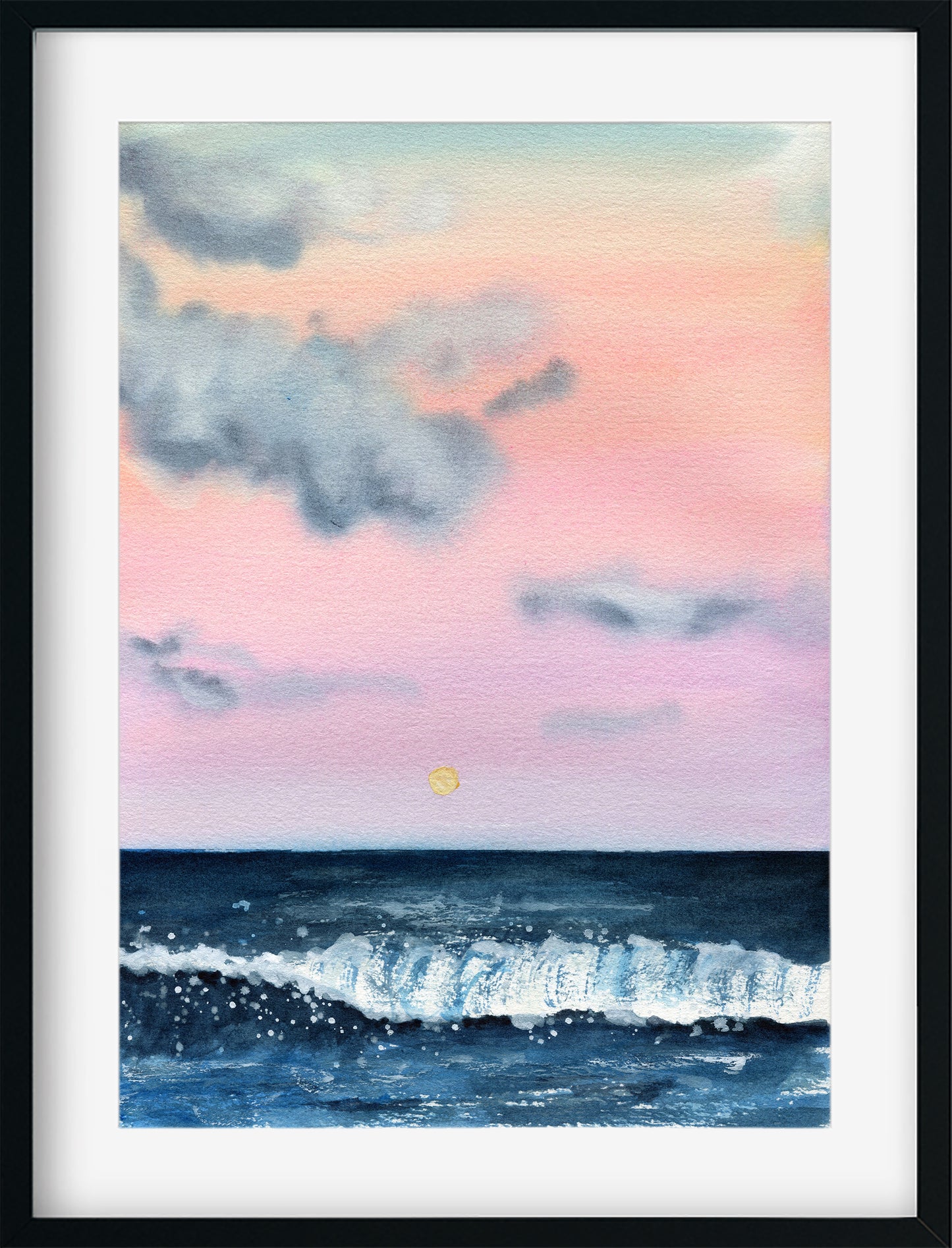 Framed artwork of a sunset over water with a colorful sky.