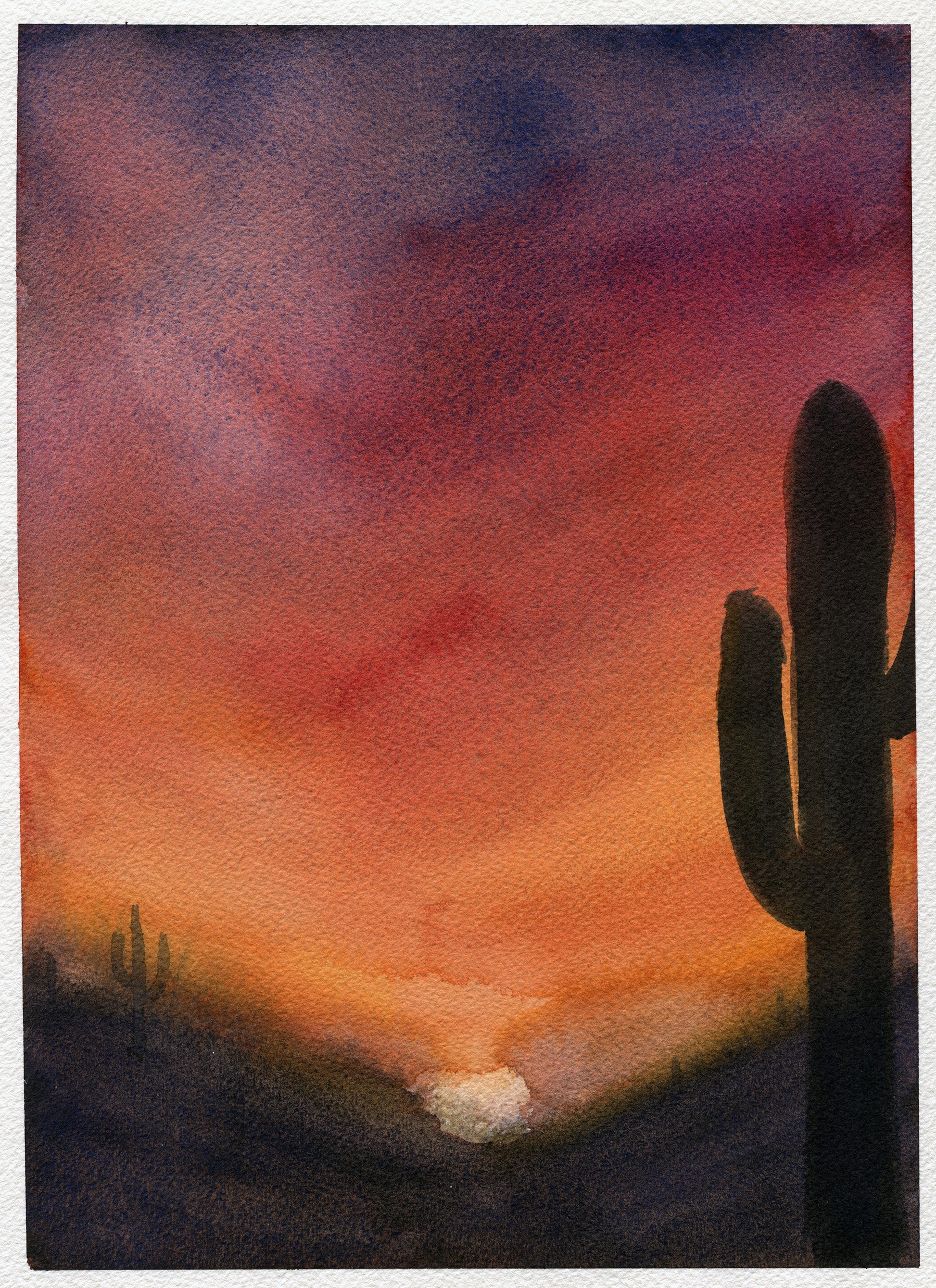 Watercolor painting of a cactus against a sunset sky with warm colors.