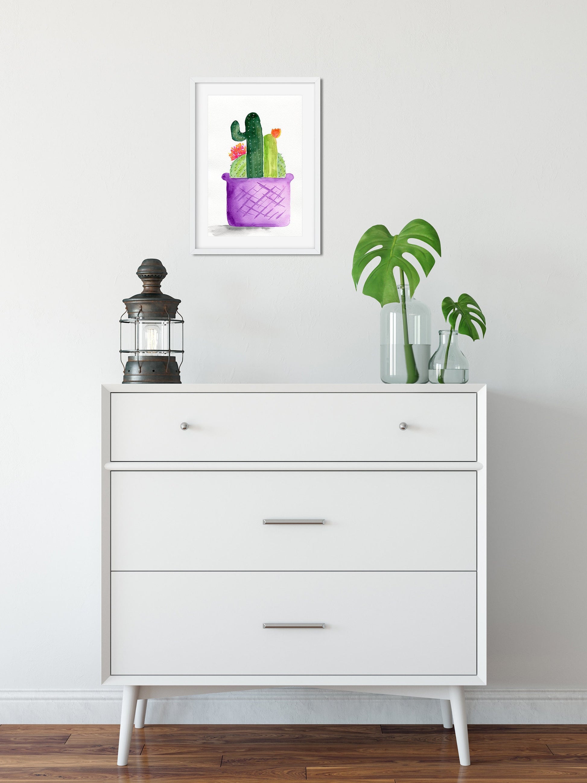 Flowering cactus in a purple planter