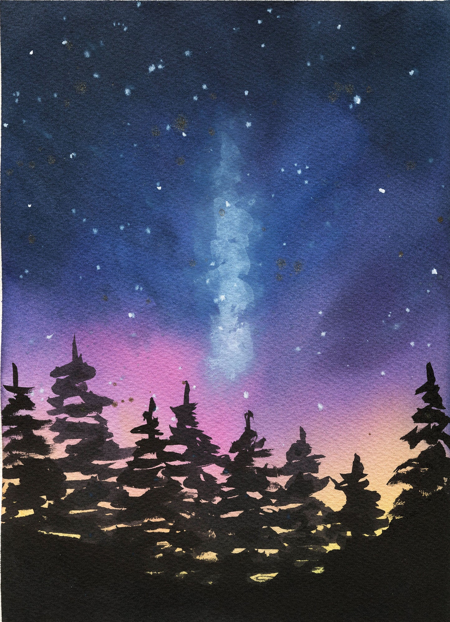 Silhouette of trees against a starry night sky with the Milky Way galaxy.