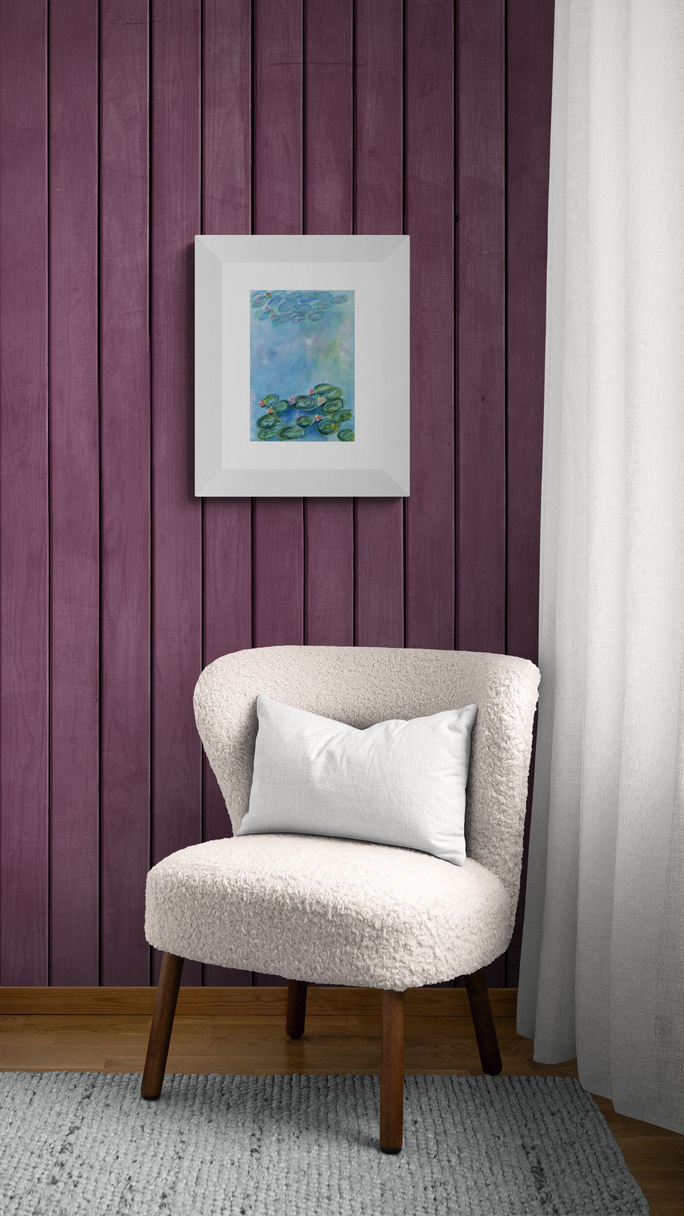 Chair with a white pillow against a purple paneled wall with a framed picture.